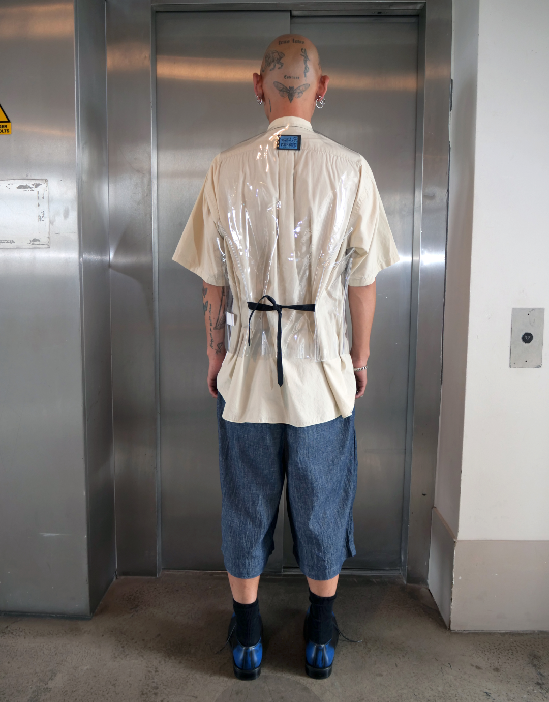 Transparent Plastic Button Down Vest